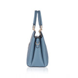 Long, blue, adjustable belt handbag with faux leather texture and printed pattern