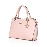 Pink faux leather women's handbag with star charm