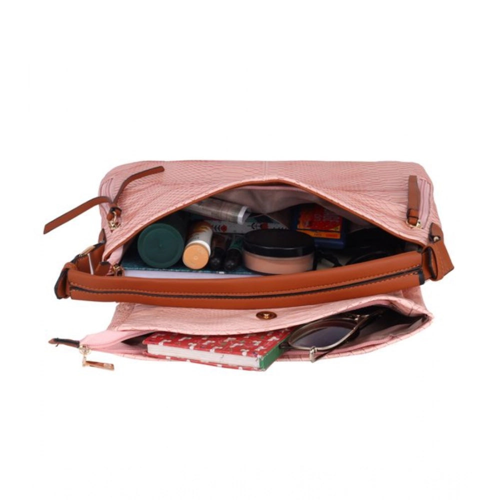 Pink faux leather textured sling bag with dual handle, synthetic lining and zipper closure