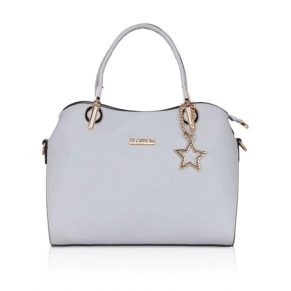 Women's faux leather handbag in a solid blue color with multiple pockets and a metal zipper