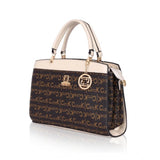 Beige faux leather printed handbag with dual handle, zipper closure, for women's fashion accessory on display