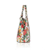 White orang faux leather printed handheld bag with dual handle, synthetic lining, and zipper closure
