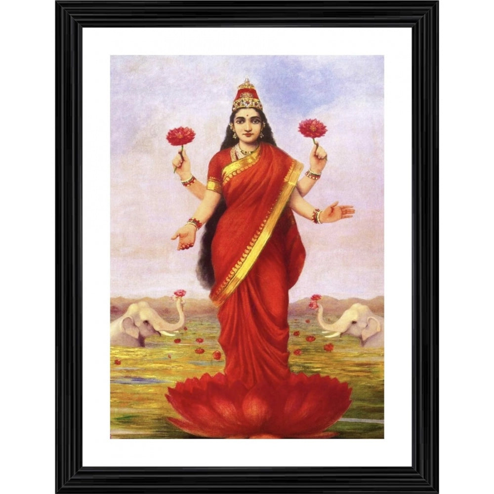 A multi-colored painting of Goddess Lakshmi with a lotus, displayed in a wooden photo frame