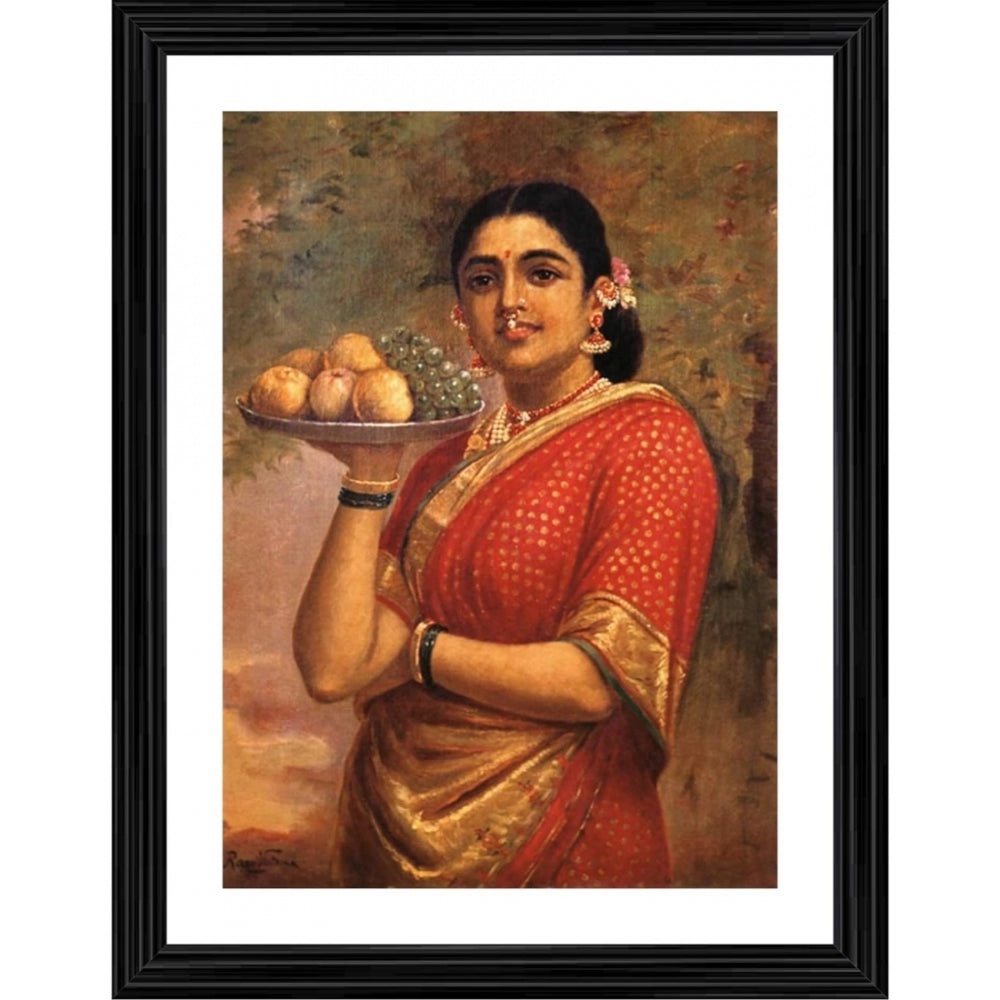 A framed artwork featuring a traditional Indian woman, dressed in a sari, holding a tray of fruit. Her attire is predominantly red and gold with a patterned design. The frame has multiple colors, including white, black, and red details around it