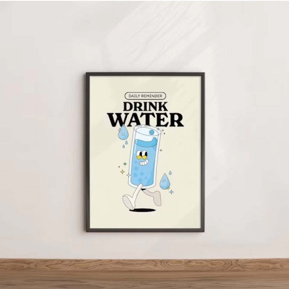 Black wall frame with a daily reminder drink water quote