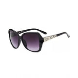 MultiColor polycarbonate unisex sunglasses with UV400 protection, oval frame style on model