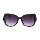 MultiColor polycarbonate unisex UV400 sunglasses, classic oval frame style on table for sun protection accessory