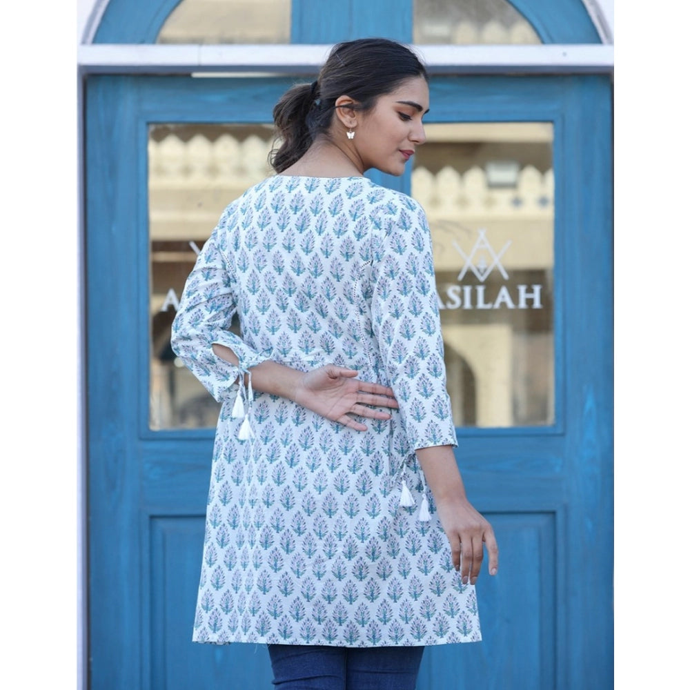 White cotton printed 3/4 sleeve round neck tunic with 34 size, vibrant pattern on short length
