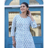 White cotton printed 3/4 sleeve round neck tunic with short length, vibrant pattern detail