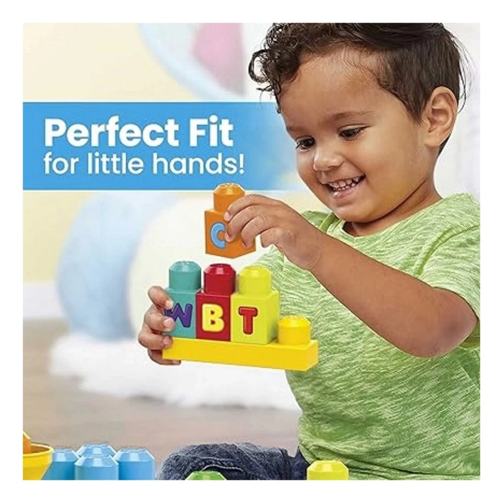 Boy playing with colorful jumbo plastic blocks; 38 pcs set, educational toy.