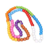 Assorted plastic counting beads for educational toys, fostering numeracy and motor skills development in children aged 3+