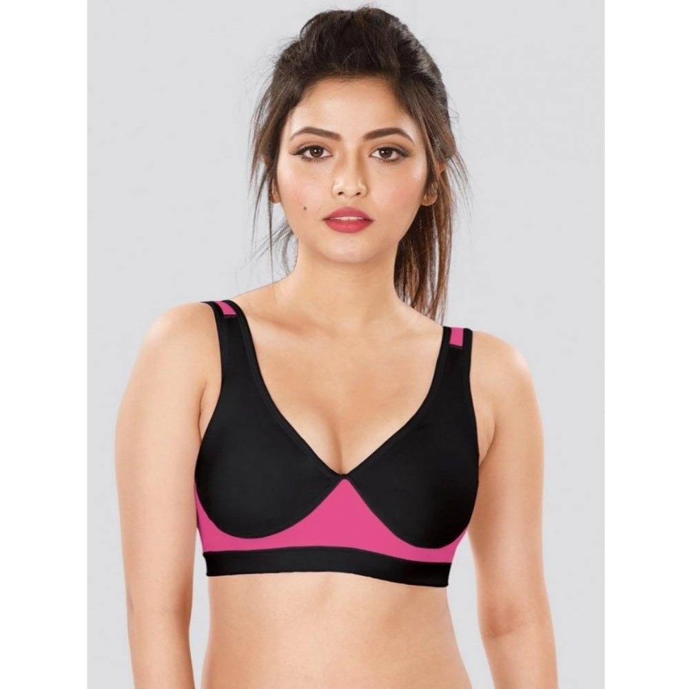 Black-Pink 4D stretch sports bra by Dermawear on model, solid design for women's fitness activities