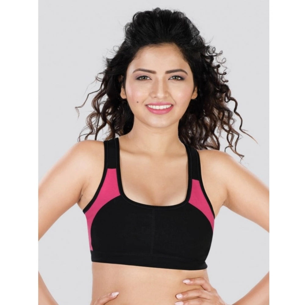Black-Pink Dermawear 4D stretch sports bra on model, women's solid black-pink athletic wear