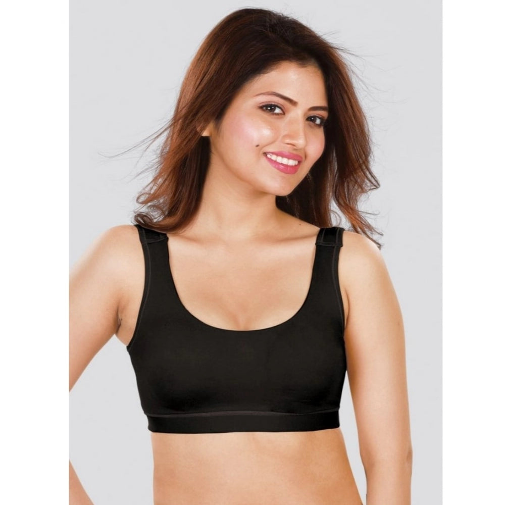 Black 4D stretch sports bra by Dermawear - solid, non-padded design for active women
