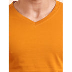 Mustard cotton men's casual solid v-neck full sleeve t-shirt on model