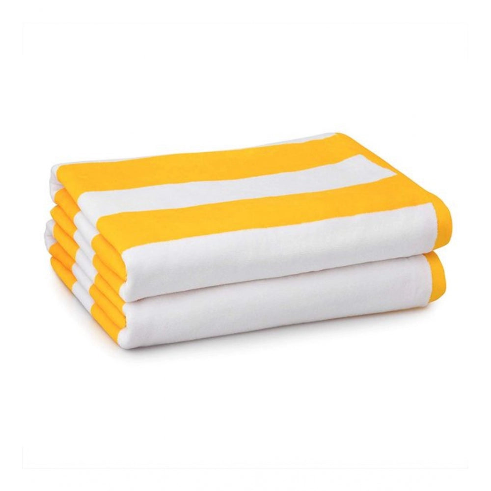 Black cotton bath towels, yellow and white, 36x71 inches.