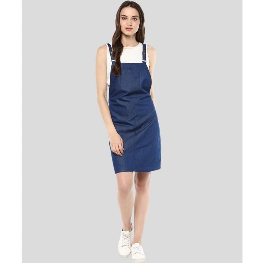 Blue denim dress with solid shoulder straps and a length above the knee