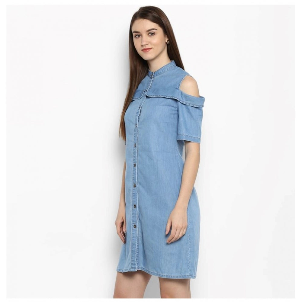 Women's blue denim dress with cold shoulder design and hem above the knee