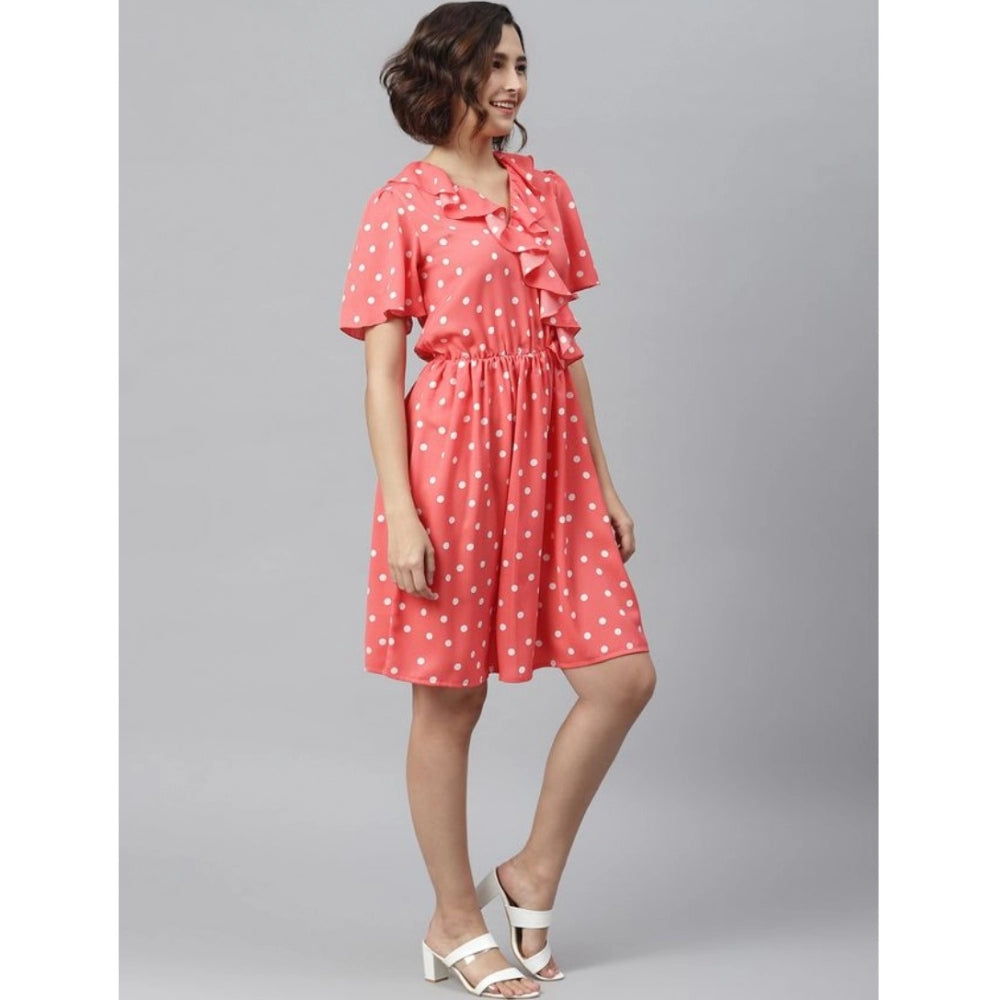 Coral polyester polka dot flutter above knee dress on model, sleeveless