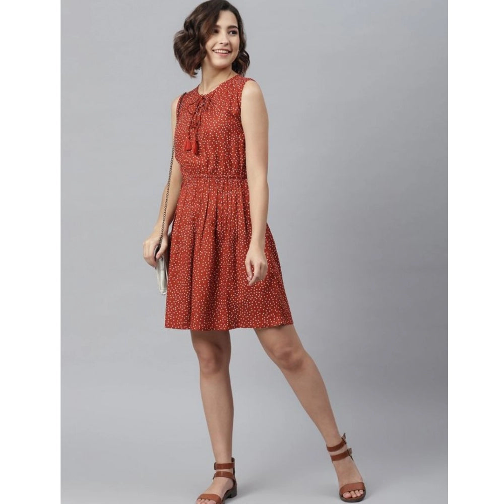 Rust-colored, rayon, sleeveless above-knee dress with polka dots