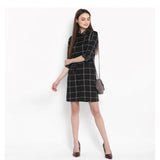 Women's black and white checkered roll up sleeve dress