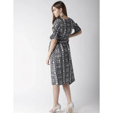 Black and white women's polyester knee-length short sleeve dress with animal print pattern