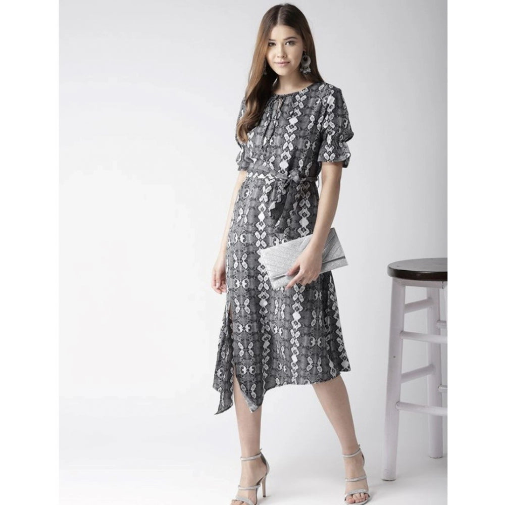 Women's short sleeve knee-length dress with black and white animal print polyester fabric