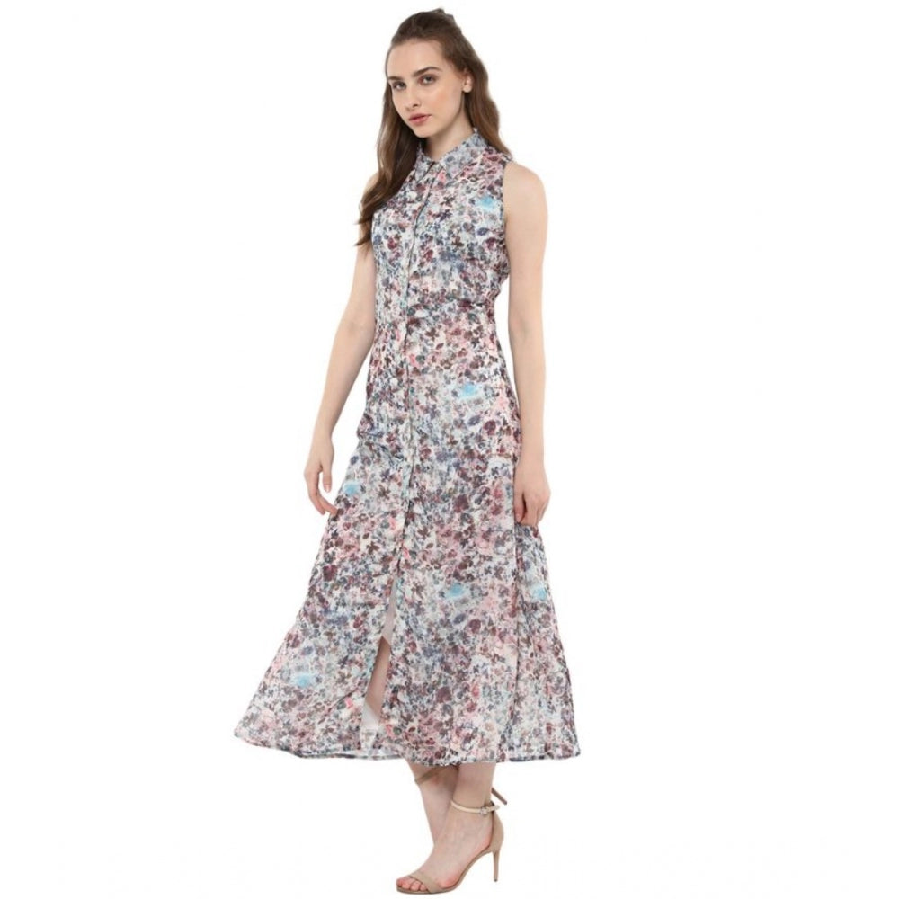 The dress is multicolor with a printed pattern. It has no sleeves and appears to be knee-length