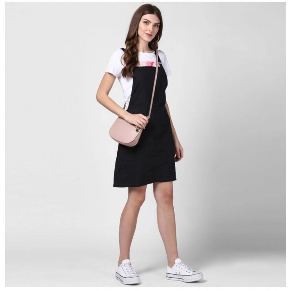Black denim dungarees with solid shoulder straps, above knee length for women's casual wear