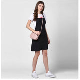 Black denim dungarees with solid shoulder straps, above knee length for women's casual wear