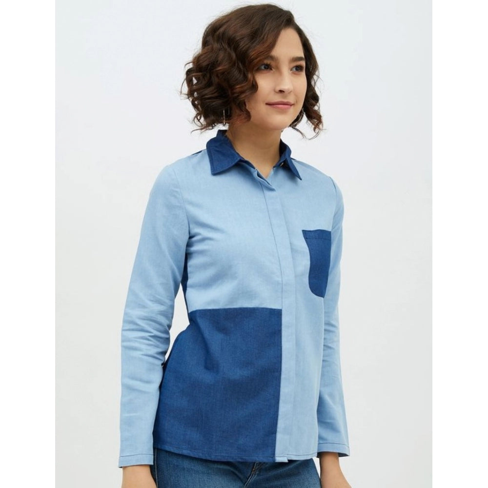 Blue denim patchwork long sleeve shirt on hanger, women's casual clothing