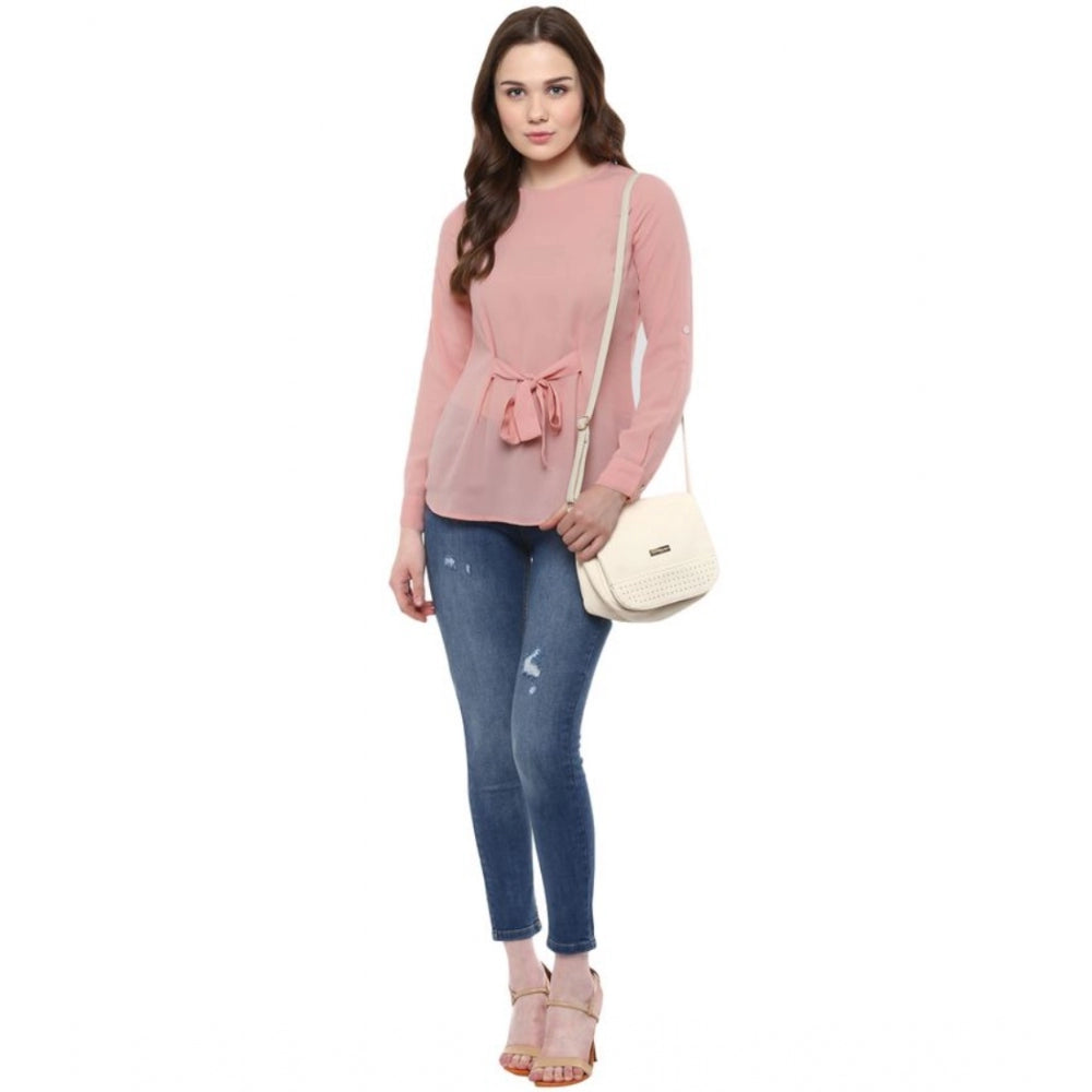 Pink polyester women's long-sleeve solid top on model