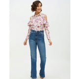 White polyester floral cold shoulder shirt with standard length, features intricate floral patterns on sleeves and collar area