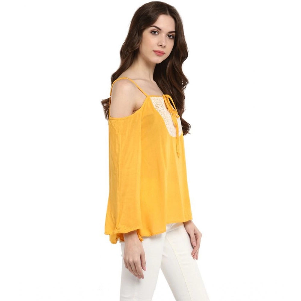 Mustard yellow rayon embellished cold shoulder top for women, intricate detailing on shoulder straps