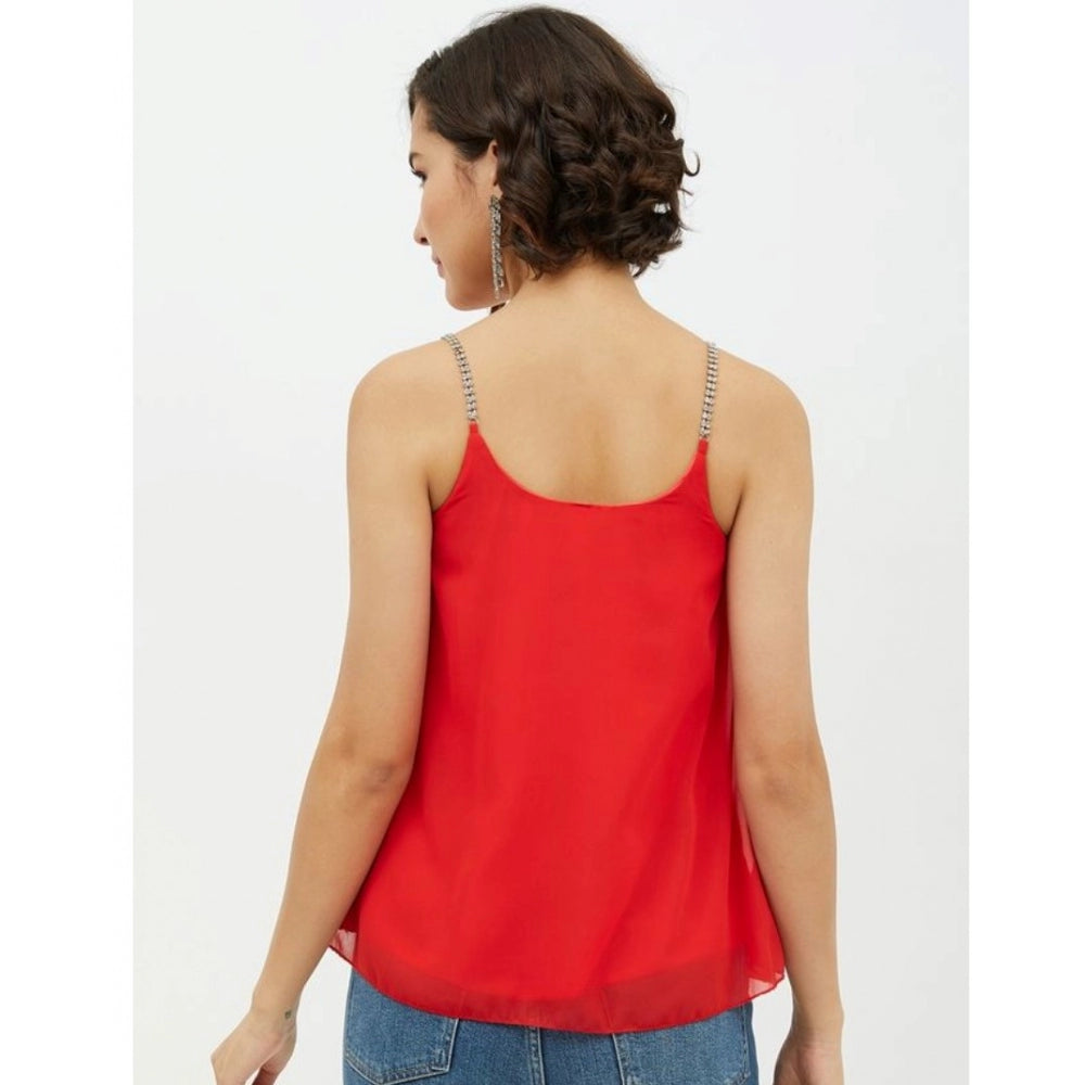 Red polyester embellished shoulder straps top for women on display, vibrant red fabric with intricate detailing