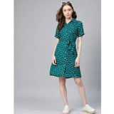 Short blue polka dot dress with white sleeves, crew neckline