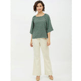 Green polyester printed 3/4th sleeves top for women, vibrant design on display