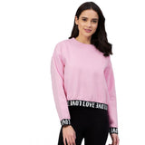 Pink fleece women's long-sleeve solid sweatshirt, round neck design on model