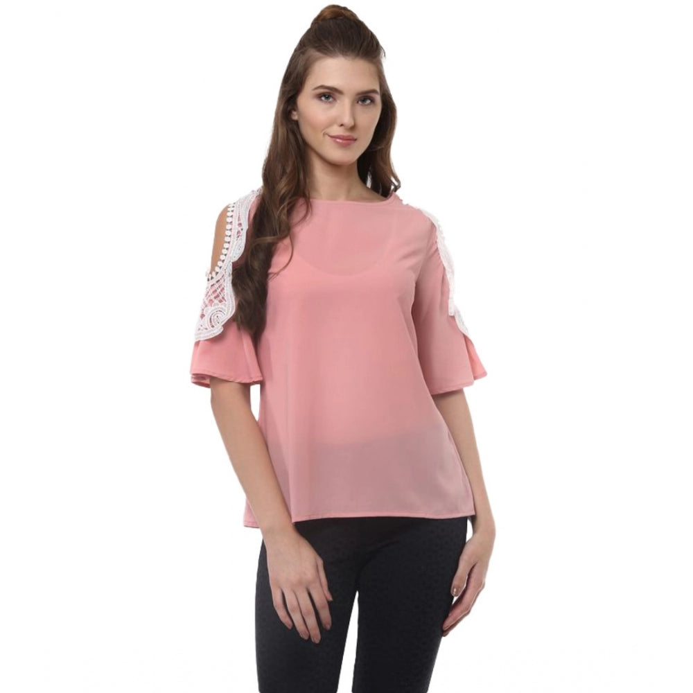 Women's pink polyester lace half sleeve top with round neck, close-up detailing lace inserts