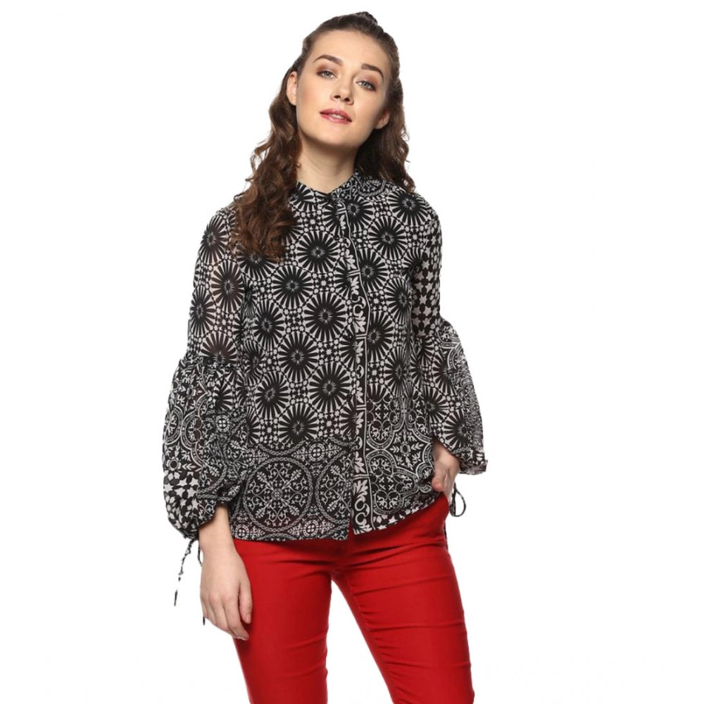 Black & White printed balloon sleeve top on mannequin, polyester material, women's fashion apparel