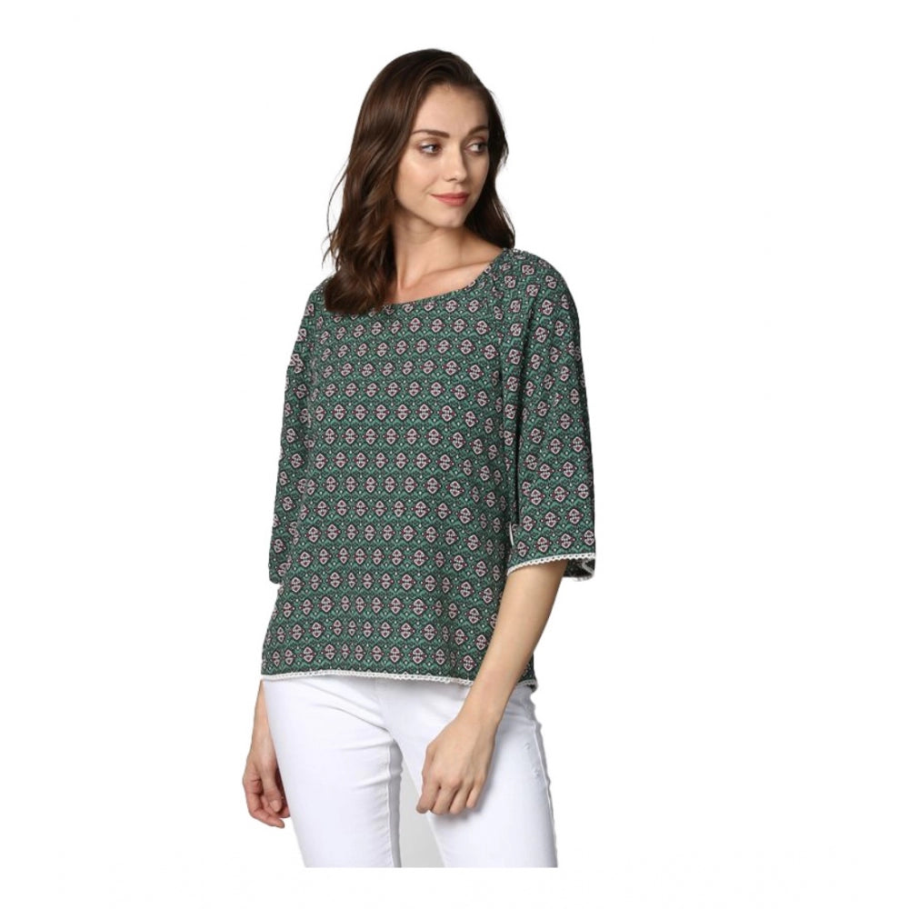 Green polyester printed women's 3/4th sleeves top, round neck, vibrant pattern detail