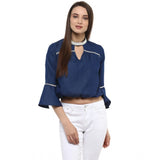 Women's blue polyester bell sleeve top, solid design with keyhole neckline on display