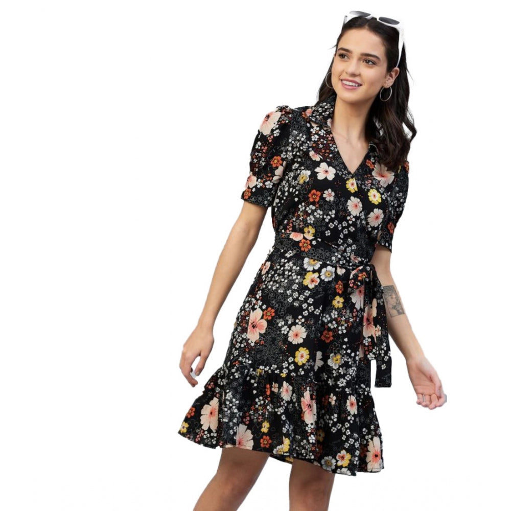 Woman in black floral dress