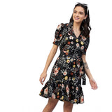 Woman in black floral dress