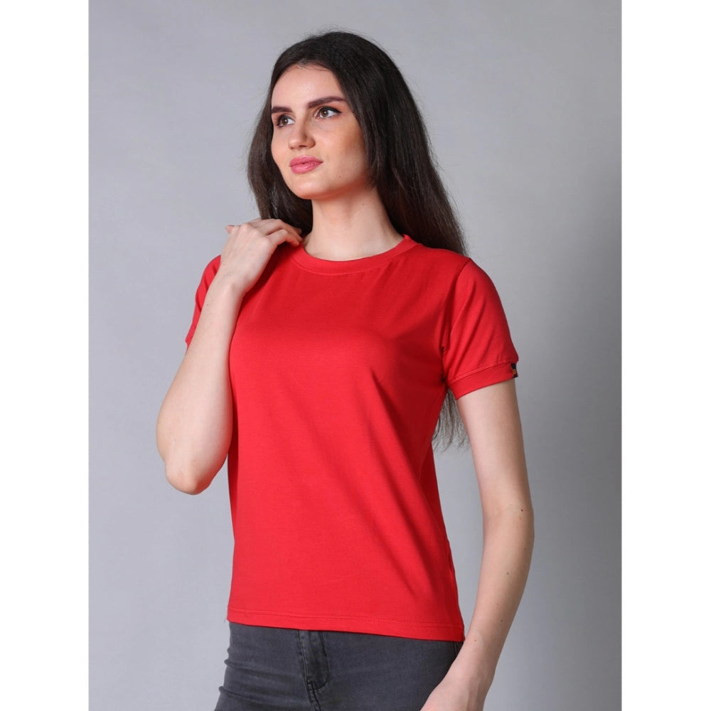 A woman wearing a red half sleeve round neck t-shirt