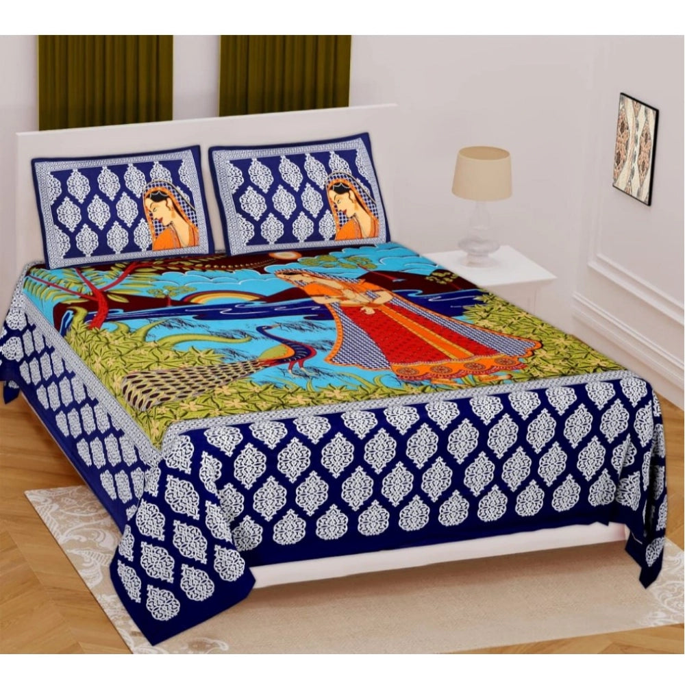 Blue cotton printed queen size bedsheet with two pillow covers, 90x100 inch on a bed