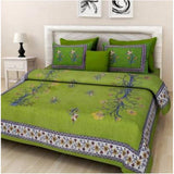 Green cotton printed queen size bedsheet with two pillow covers, featuring a vibrant design, suitable for any bedroom decor