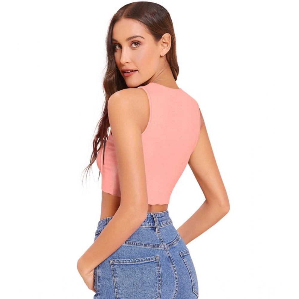 Peach polyester solid sleeveless round neck top for women's fashion, vibrant peach color on smooth fabric