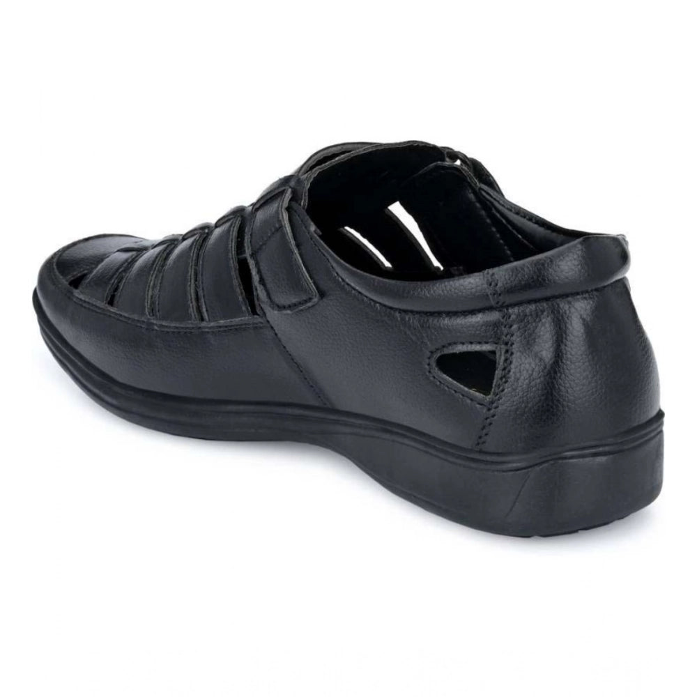 Black faux leather casual sandal with solid design and Velcro closure for men's comfortable footwear