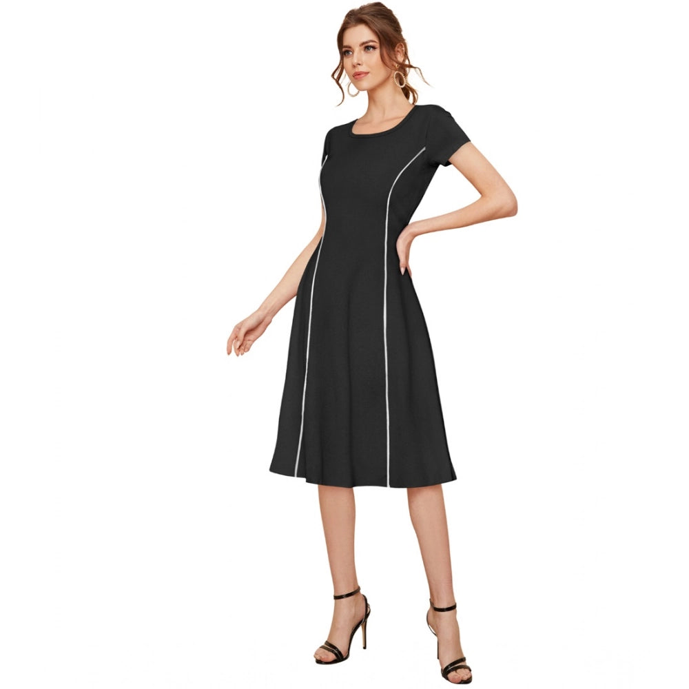 The image displays a black, solid round neck cap sleeve dress